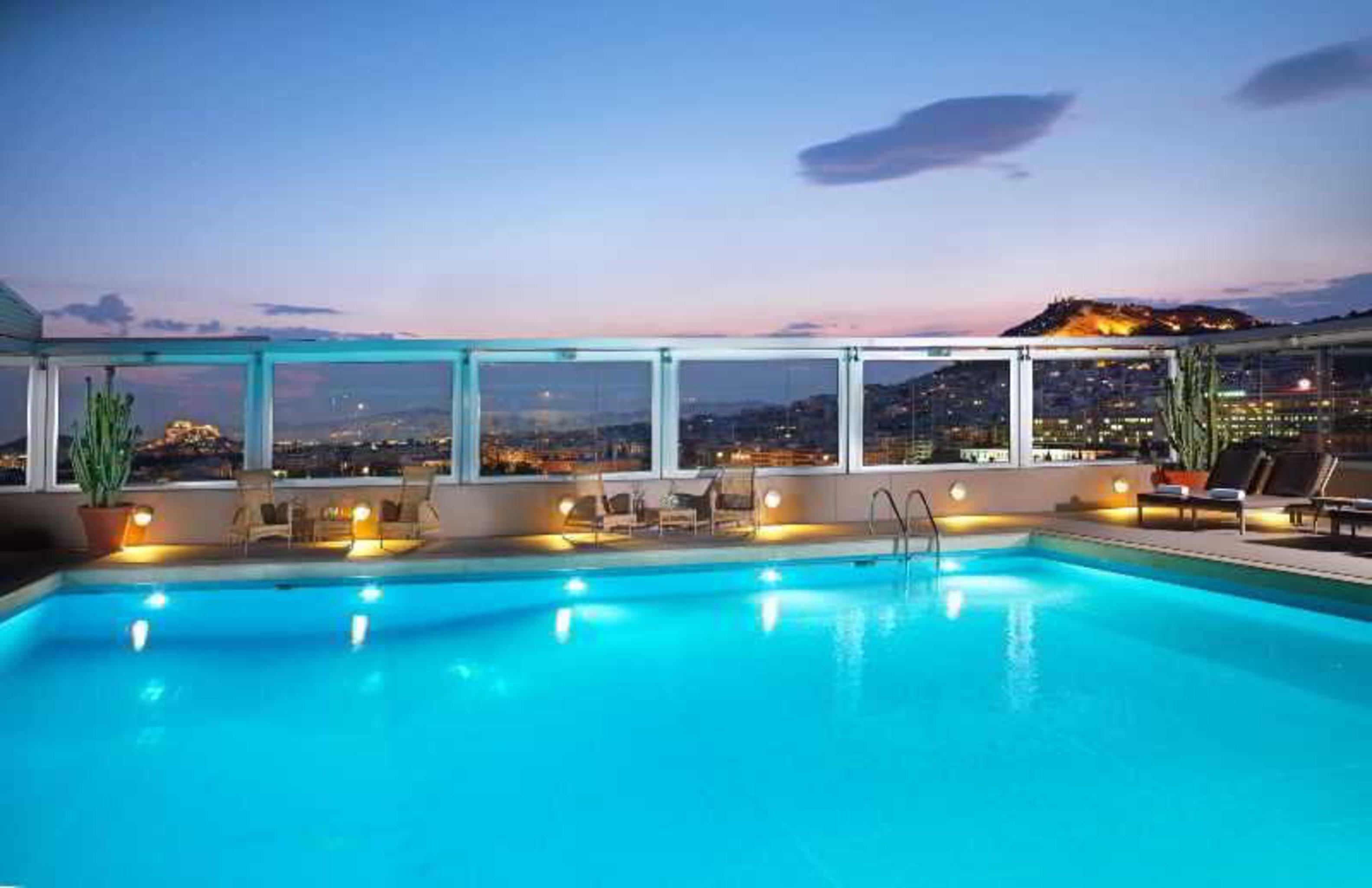 Divani Caravel Athens Exterior photo The pool at the hotel