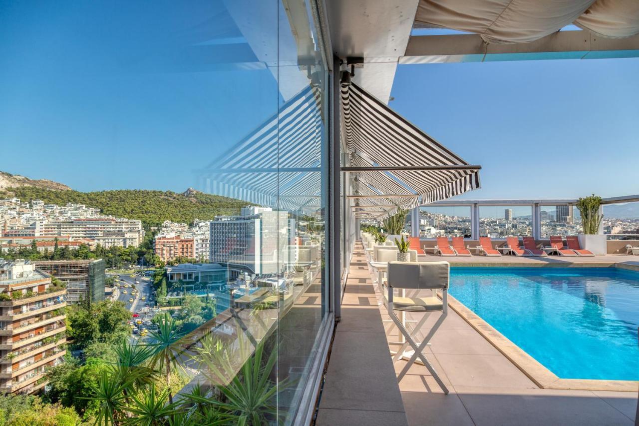 Divani Caravel Athens Exterior photo The pool at the hotel
